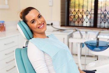Woman about to receive emergency dental treatment, Downey CA