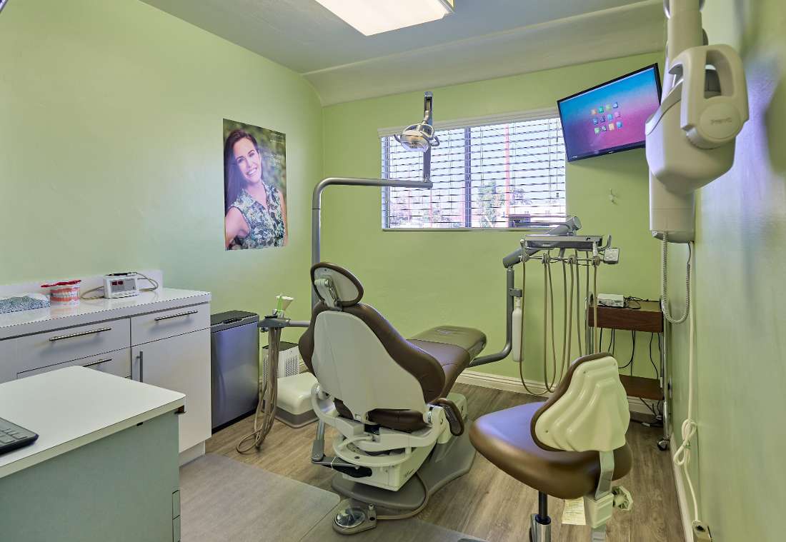 Interior view of a patient room thats painted green, christian yang dds