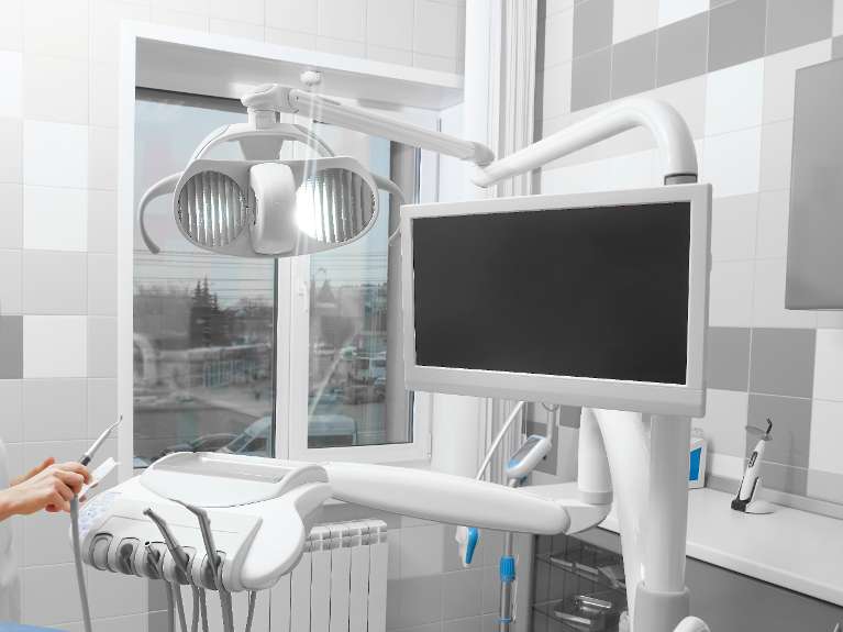 TV in treatment room for x-ray and photo display for dental patients, Downey CA